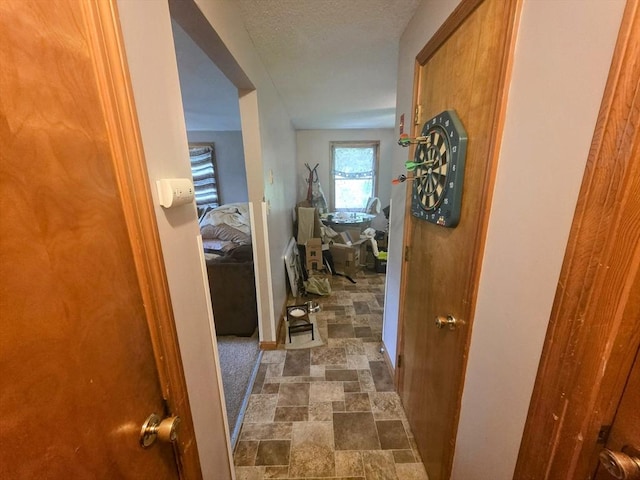 209-211 Ventura St, Ludlow, MA 01056 - hallway featuring dark stone finish floors