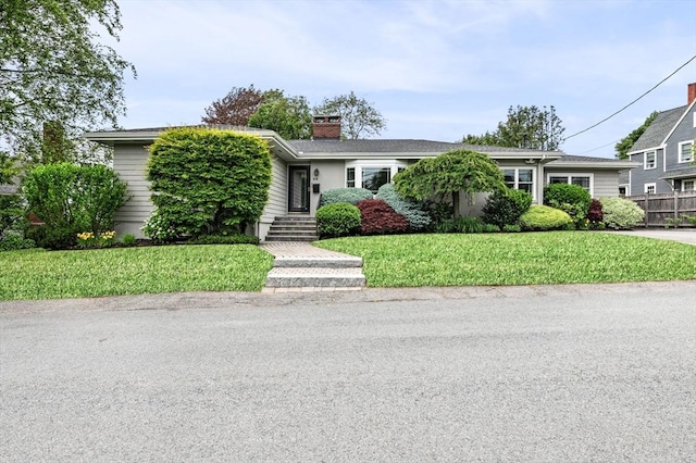 64 Pond St, Nahant, MA 01908 - view of front facade featuring a chimney