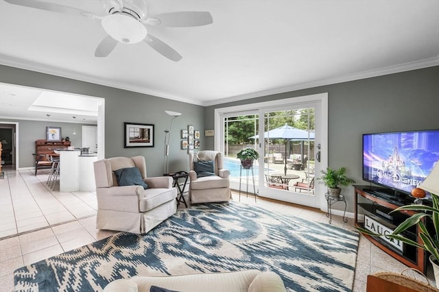 64 Pond St, Nahant, MA 01908 - living area with ornamental molding, light tile patterned floors, and a ceiling fan