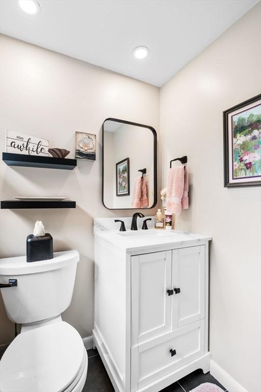 64 Pond St, Nahant, MA 01908 - half bath with vanity and tile patterned floors