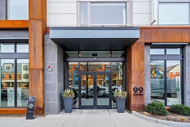 view of exterior entry featuring french doors