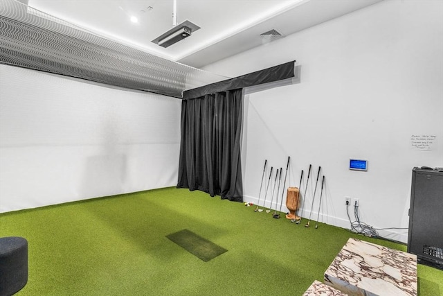 game room with golf simulator and carpet flooring