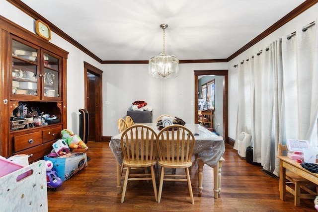 27-29 Waite St, Malden, MA 02148 - dining room with a chandelier, dark wood finished floors, and crown molding