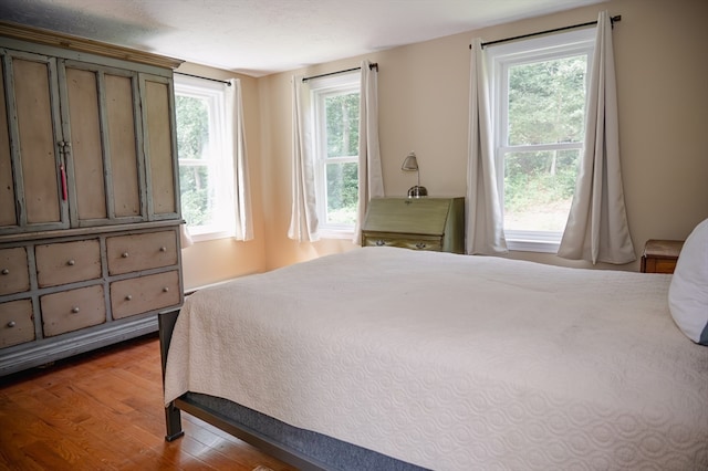 bedroom featuring hardwood / wood-style flooring