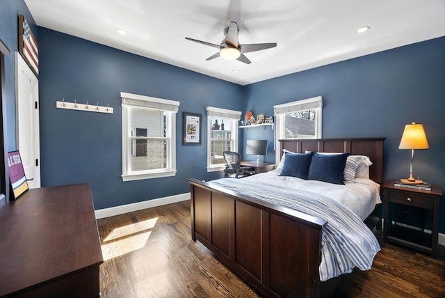 bedroom with wood finished floors, baseboards, an office area, recessed lighting, and ceiling fan