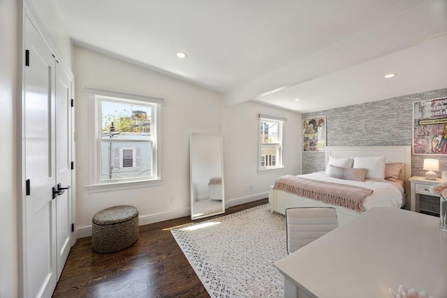 bedroom with multiple windows, baseboards, dark wood-style flooring, beam ceiling, and recessed lighting