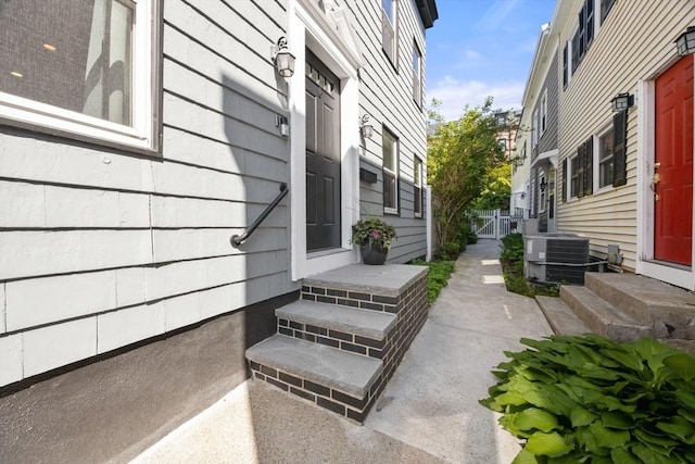 view of patio / terrace featuring central air condition unit and entry steps