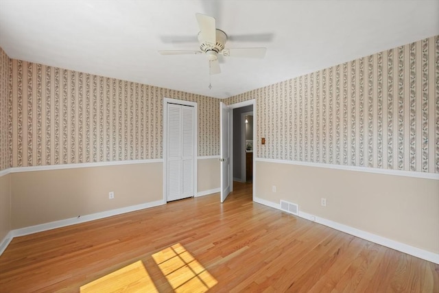 45 Donamor Ln, East Longmeadow, MA 01028 - spare room featuring wallpapered walls, wood finished floors, ceiling fan, and baseboards