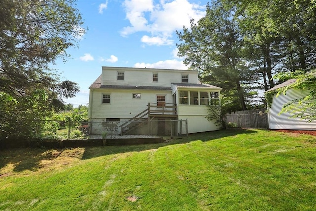 45 Donamor Ln, East Longmeadow, MA 01028 - rear view of house with a sunroom and stairs