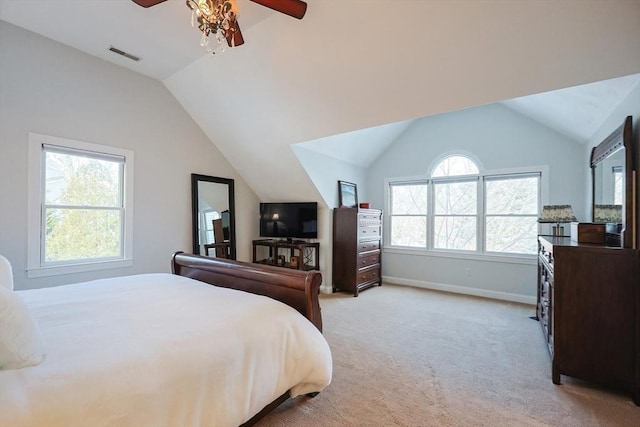 bedroom with baseboards, visible vents, light colored carpet, lofted ceiling, and ceiling fan