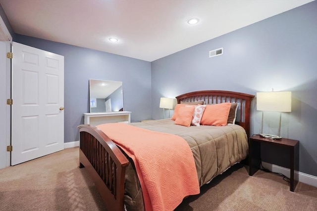 carpeted bedroom featuring baseboards, visible vents, and recessed lighting