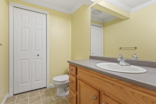 96 Caspian Way Unit 96, Fitchburg, MA 01420 - bathroom with a closet, toilet, ornamental molding, vanity, and baseboards