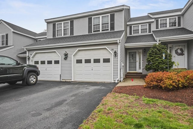 96 Caspian Way Unit 96, Fitchburg, MA 01420 - townhome / multi-family property featuring driveway, a garage, and roof with shingles