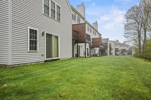 96 Caspian Way Unit 96, Fitchburg, MA 01420 - rear view of house featuring a yard, a residential view, and central AC