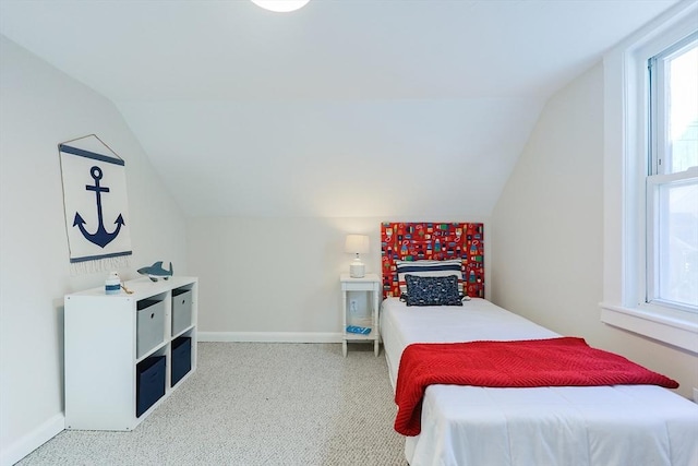 bedroom featuring vaulted ceiling