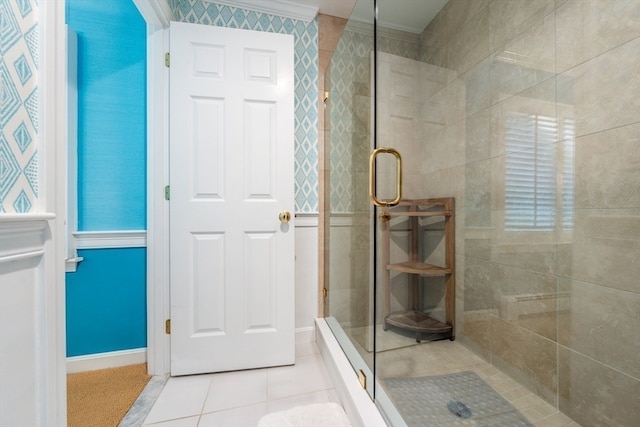 bathroom featuring tile patterned flooring and a shower with shower door