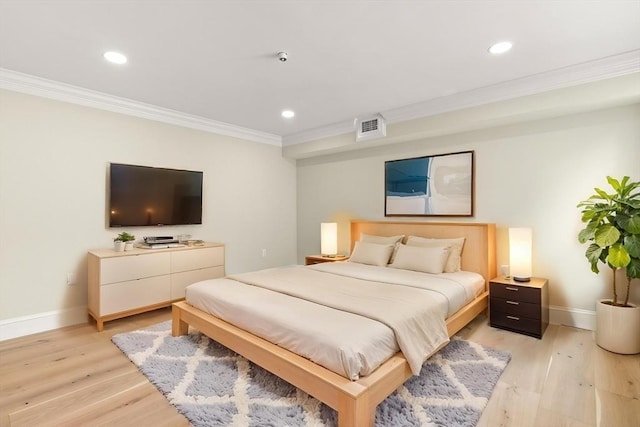 bedroom featuring recessed lighting, baseboards, ornamental molding, and light wood-style floors