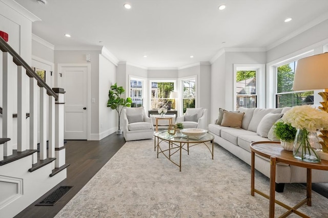 living area featuring stairs, dark wood-style floors, recessed lighting, baseboards, and ornamental molding