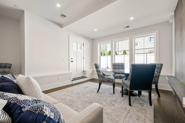 dining space with dark wood-style floors, baseboards, and recessed lighting