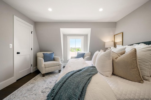 bedroom featuring wood finished floors, recessed lighting, and baseboards