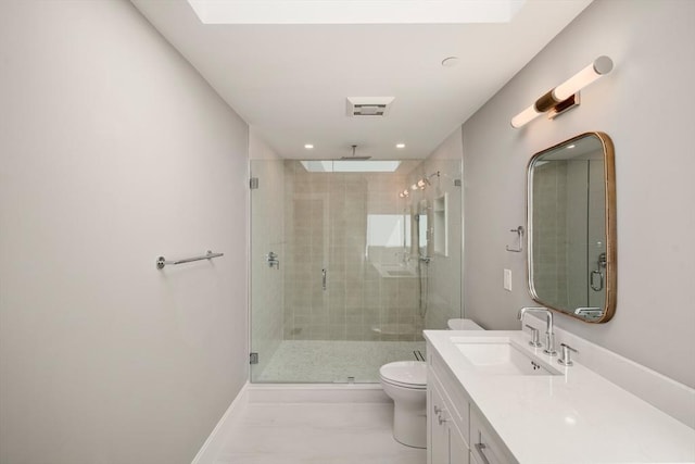 full bath featuring toilet, vanity, a stall shower, marble finish floors, and baseboards