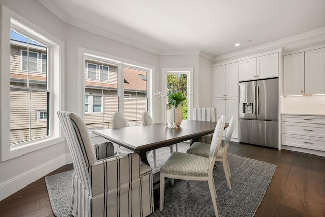 dining space featuring plenty of natural light, ornamental molding, dark wood-style flooring, baseboards, and recessed lighting
