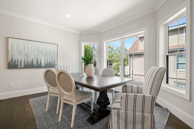 dining space with ornamental molding, baseboards, dark wood-style floors, and recessed lighting