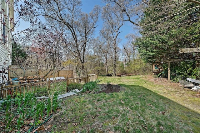 view of yard with fence