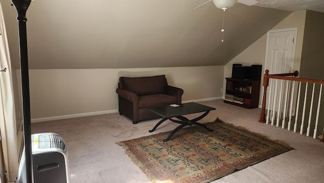sitting room featuring carpet floors, ceiling fan, vaulted ceiling, and baseboards