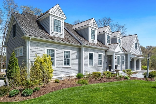 exterior space featuring a front yard