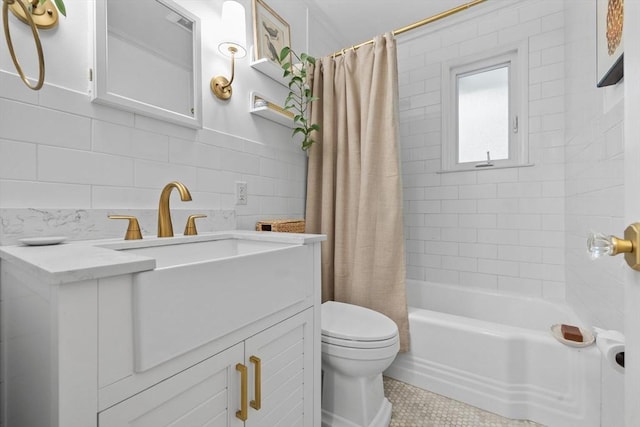 2313 Washington St, Holliston, MA 01746 - bathroom with toilet, vanity, shower / tub combo with curtain, tile patterned flooring, and tile walls