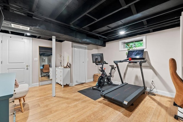 2313 Washington St, Holliston, MA 01746 - exercise room featuring wood finished floors and baseboards