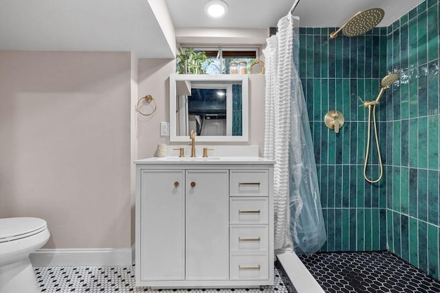 2313 Washington St, Holliston, MA 01746 - full bath featuring toilet, vanity, a tile shower, tile patterned floors, and baseboards
