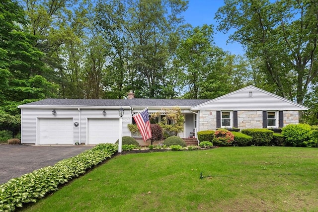 2313 Washington St, Holliston, MA 01746 - single story home with asphalt driveway, an attached garage, a front yard, a chimney, and stone siding