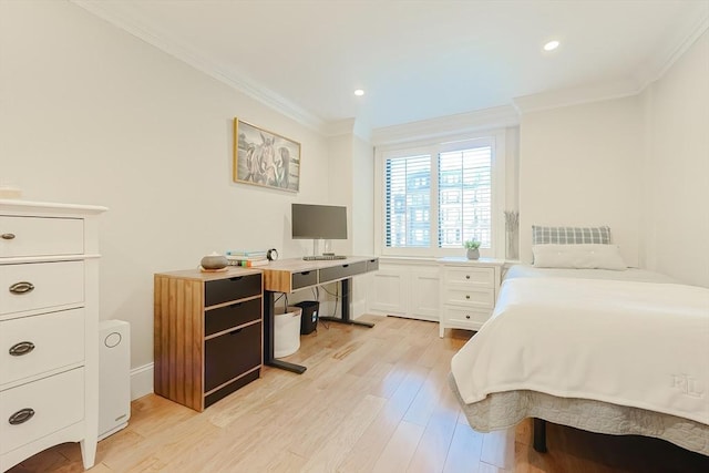 bedroom featuring light hardwood / wood-style floors and ornamental molding