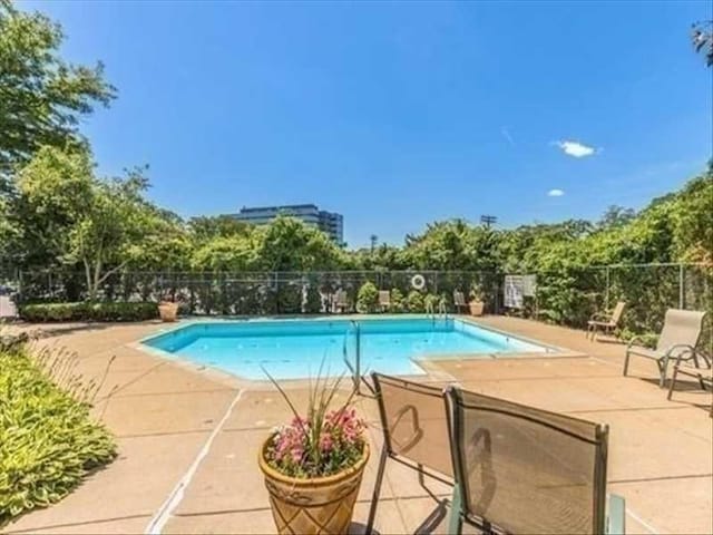 133 Commander Shea Blvd Unit 315, Quincy, MA 02171 - community pool featuring fence and a patio area