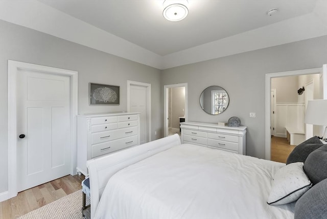 bedroom with light hardwood / wood-style floors