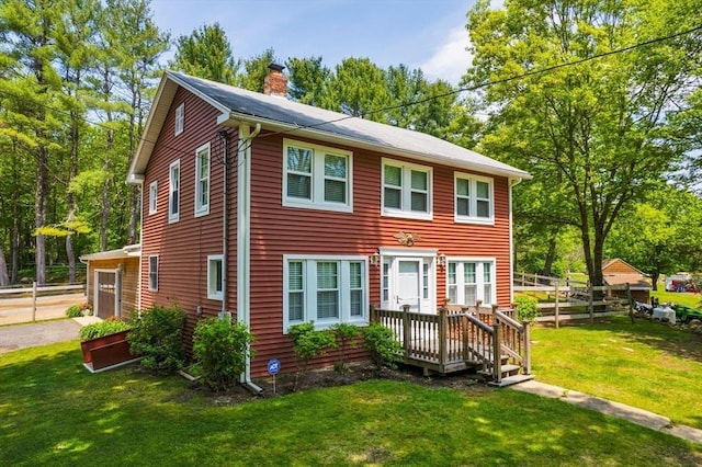 8 Intervale Rd, Rutland, MA 01543 - view of front of home featuring a chimney, a front lawn, driveway, and a deck