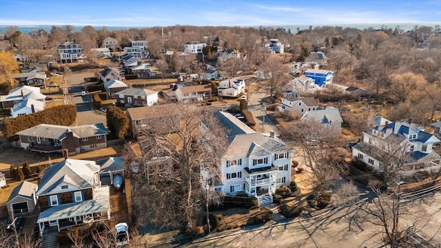 birds eye view of property with a residential view