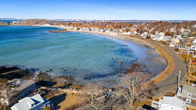 bird's eye view with a beach view and a water view