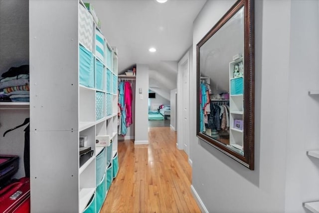 corridor featuring light hardwood / wood-style floors