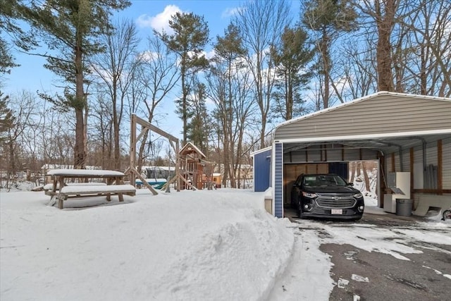 exterior space featuring a carport and a playground