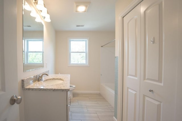 27 Williams St Unit 27, Methuen, MA 01844 - full bathroom featuring vanity, toilet, shower / bath combination, and baseboards