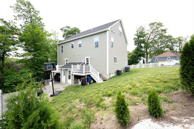 27 Williams St Unit 27, Methuen, MA 01844 - rear view of property featuring stairs, a wooden deck, and central AC