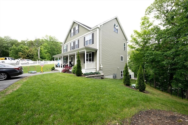 27 Williams St Unit 27, Methuen, MA 01844 - view of front of house featuring covered porch and a front yard