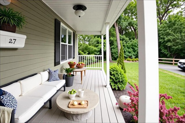 27 Williams St Unit 27, Methuen, MA 01844 - porch with outdoor lounge area and a lawn