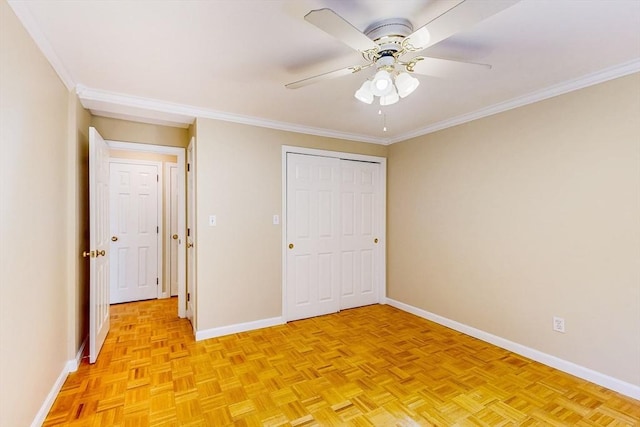 329 Harvard St Unit 11, Cambridge, MA 02139 - unfurnished bedroom with baseboards, crown molding, a closet, and ceiling fan