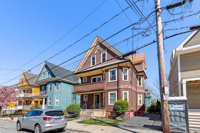view of front of house with fence