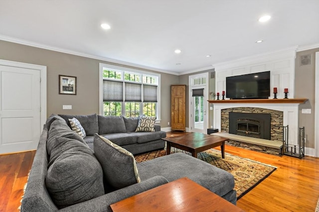 218 Pine St, Rehoboth, MA 02769 - living area featuring ornamental molding, wood finished floors, recessed lighting, a fireplace, and baseboards