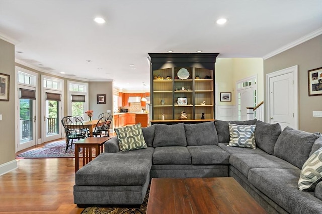 218 Pine St, Rehoboth, MA 02769 - living room featuring crown molding, recessed lighting, and wood finished floors